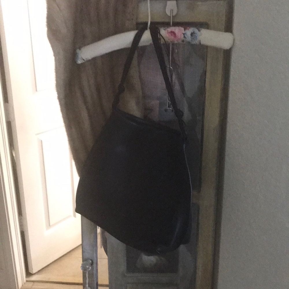 The Row Wander bag with tags black leather- never used perfect condition